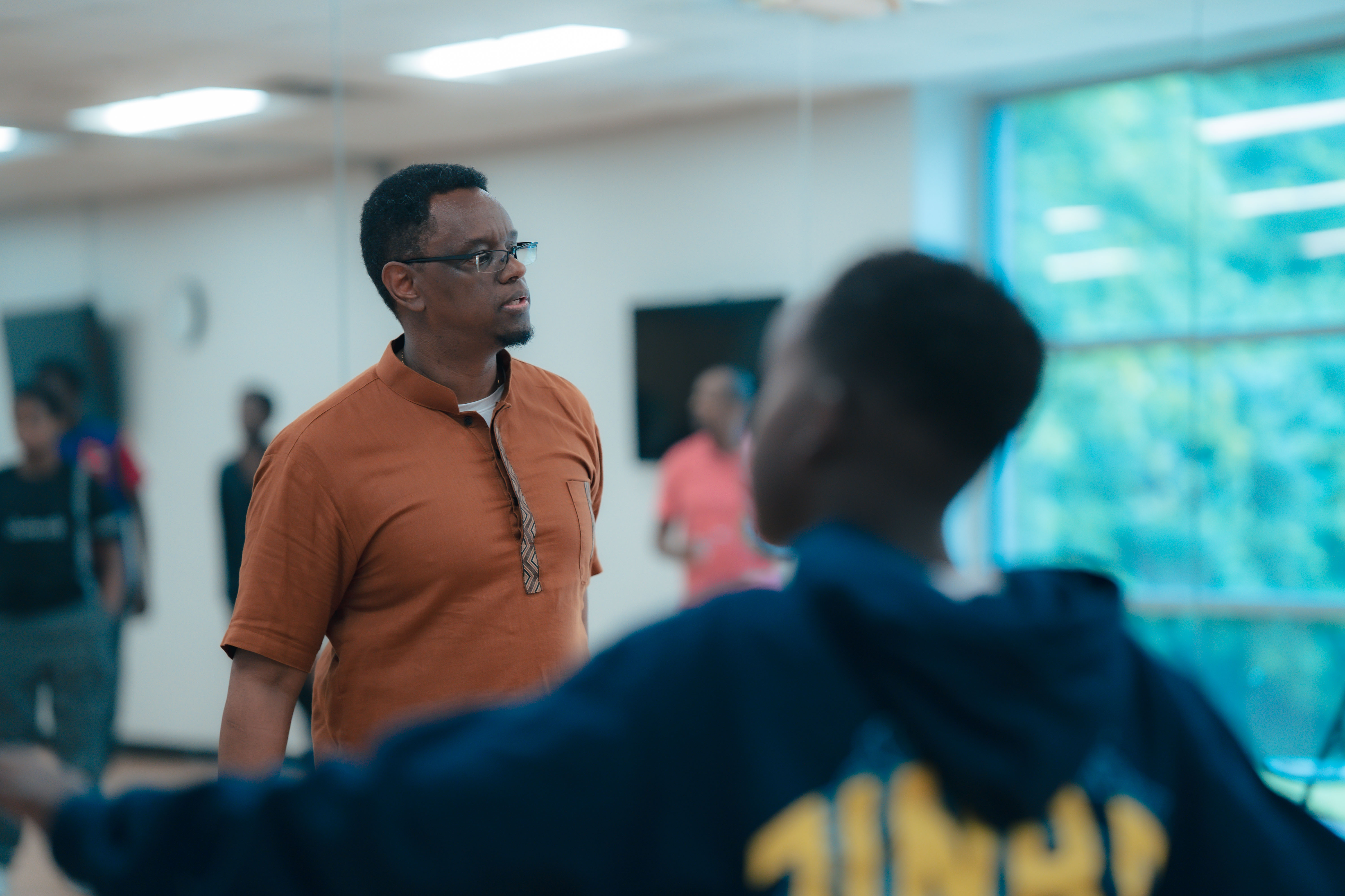 Instructor with youth students