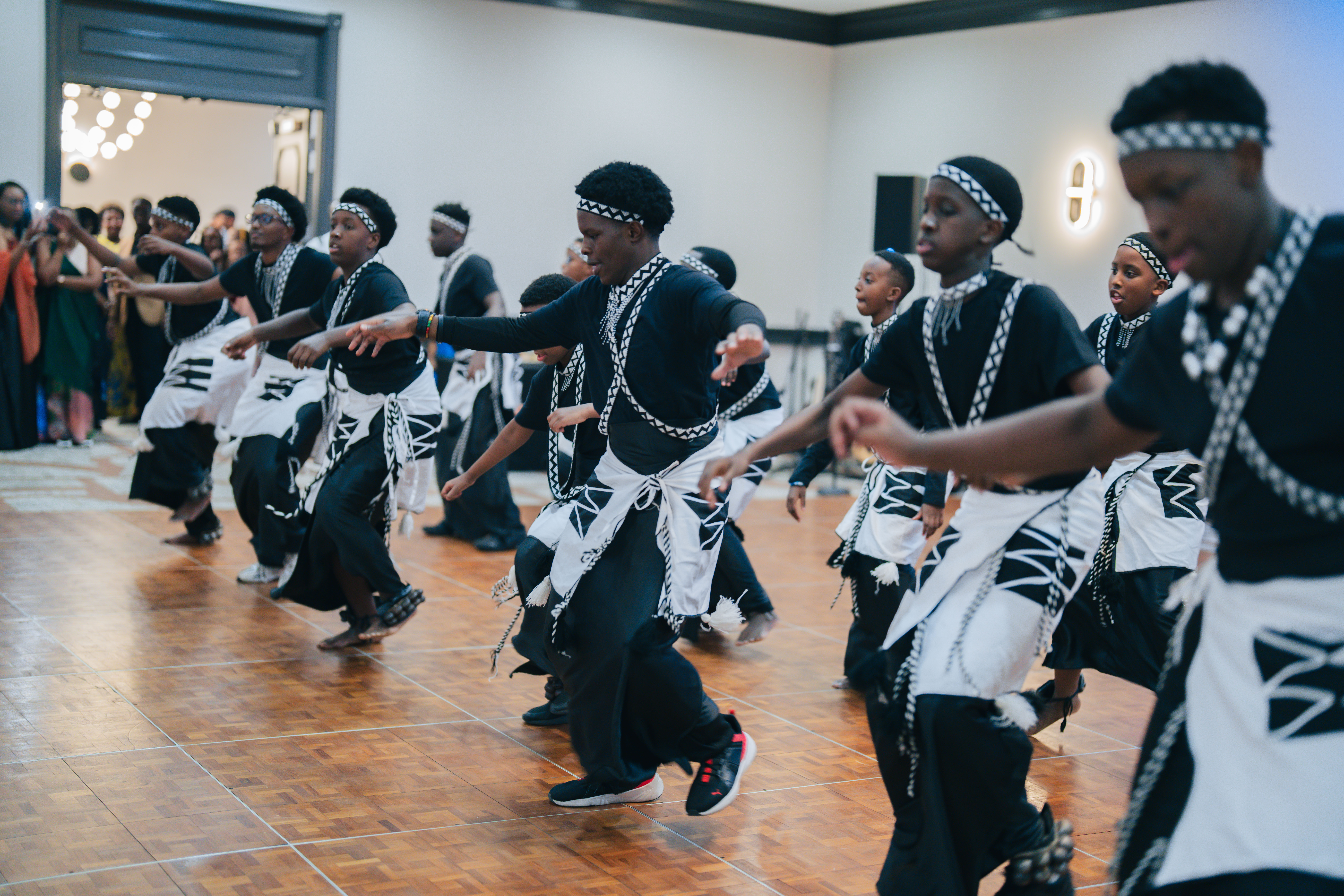 Group of youth dancing in sync