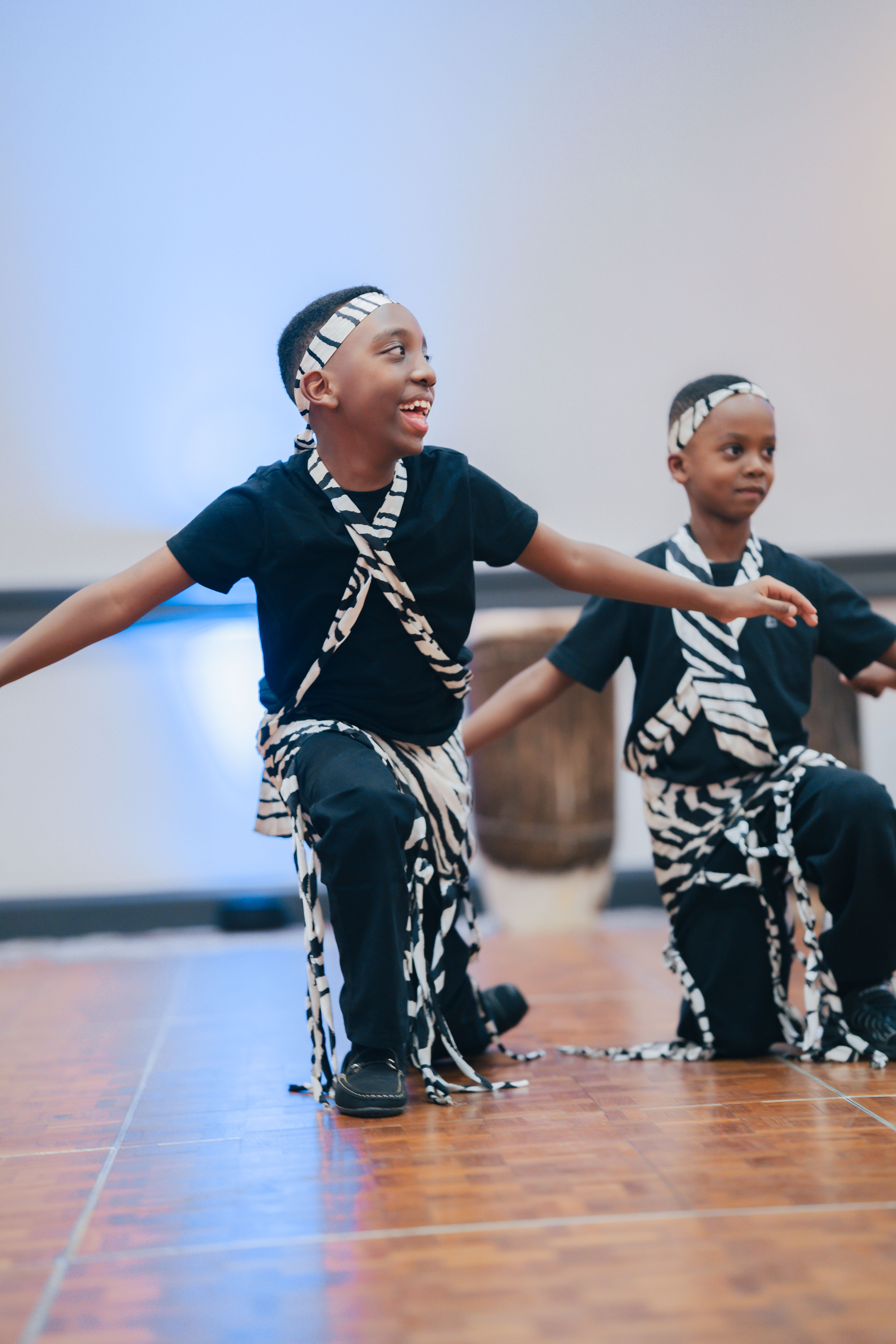 Two youth dancers in traditional costume