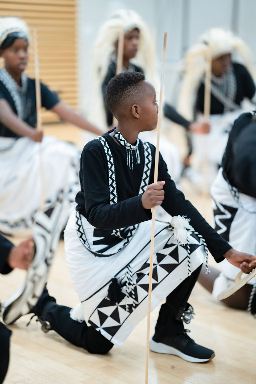 Youth group in traditional dance formation