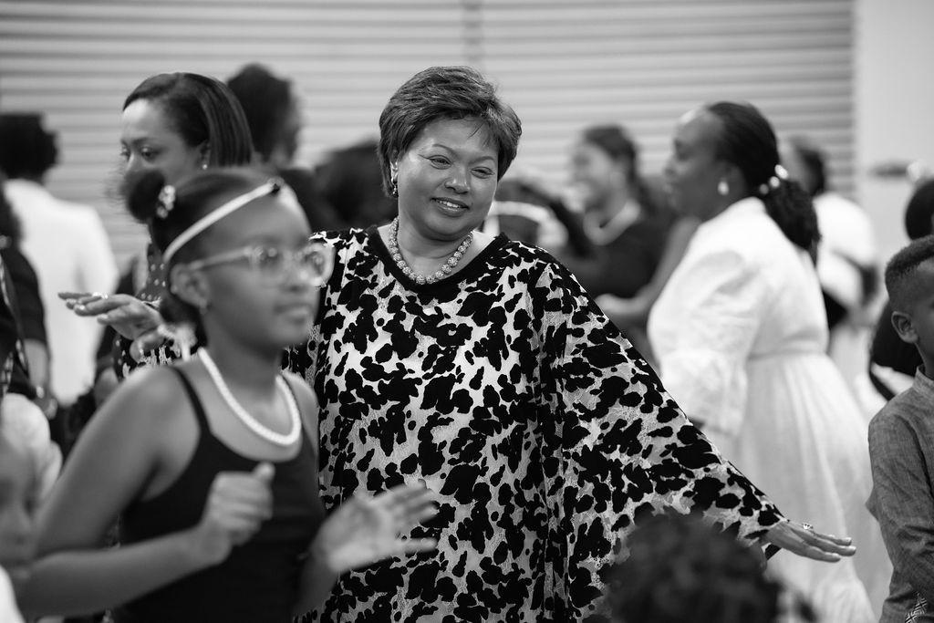 Community crowd dancing together at celebration