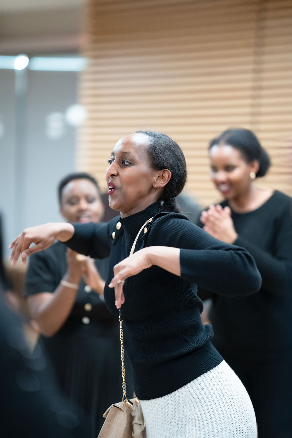 Group of women dancing at community event