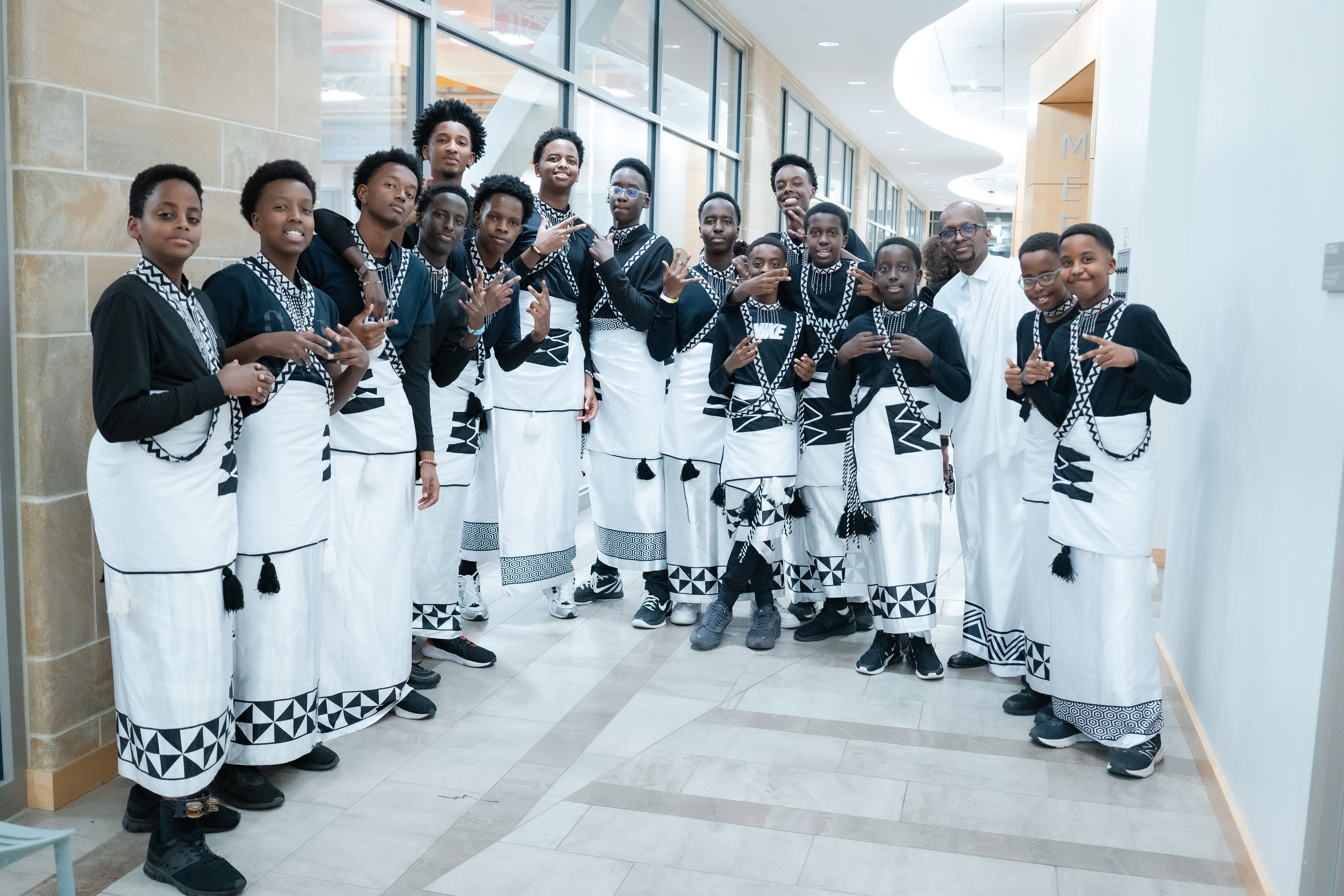 Youth group in traditional white costumes